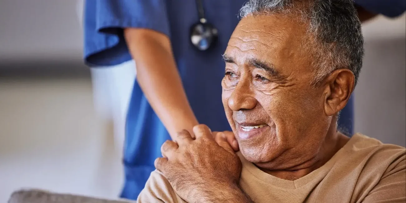 Carer assisting with mobility